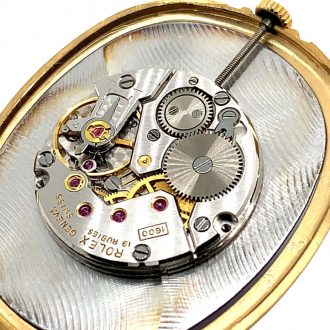 Elegant Swiss 18K gold open faced dress watch Circa 1975
