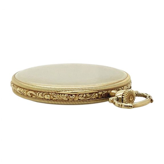 Flat Swiss 18K gold open faced lever dress watch Circa 1922 Flat Swiss 18K gold open faced lever dress watch Circa 1922