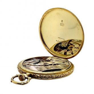 Flat Swiss 18K gold open faced lever dress watch Circa 1922