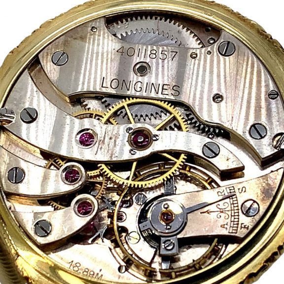 Flat Swiss 18K gold open faced lever dress watch Circa 1922 Flat Swiss 18K gold open faced lever dress watch Circa 1922