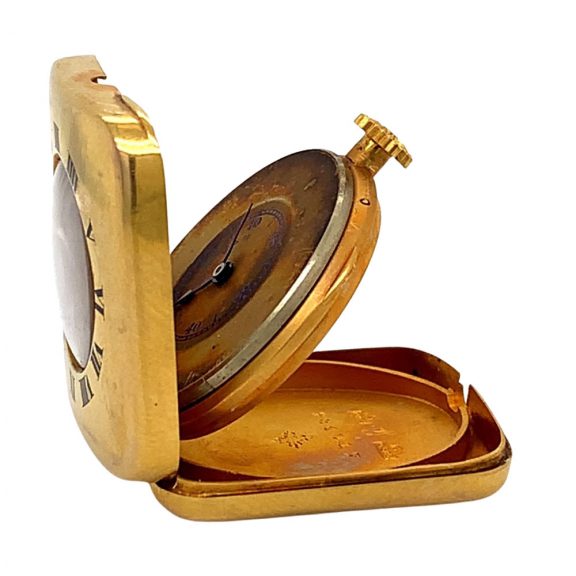 Unique Swiss 14K gold miniature lever purse watch Circa 1917 Unique Swiss 14K gold miniature lever purse watch Circa 1917