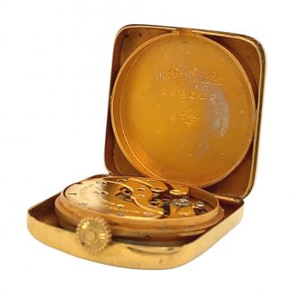 Unique Swiss 14K gold miniature lever purse watch Circa 1917