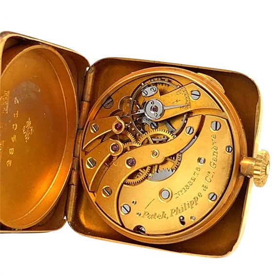 Unique Swiss 14K gold miniature lever purse watch Circa 1917 Unique Swiss 14K gold miniature lever purse watch Circa 1917