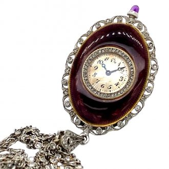 Swiss oval belle époque pendant watch with chain Circa 1910 Swiss oval belle époque pendant watch with chain Circa 1910