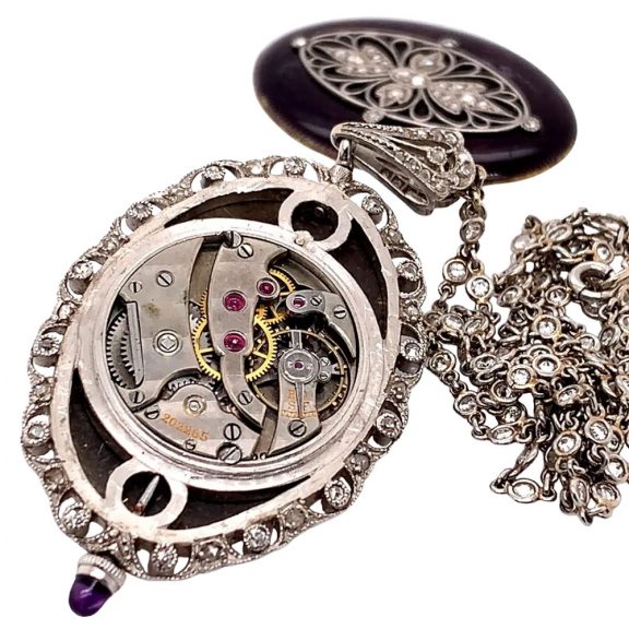 Swiss oval belle époque pendant watch with chain Circa 1910 Swiss oval belle époque pendant watch with chain Circa 1910
