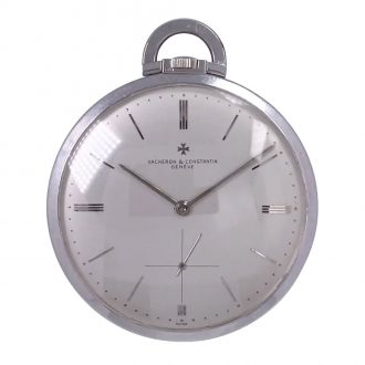 Flat Swiss 18K white gold dress watch with chain Circa 1957