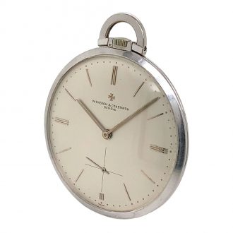 Flat Swiss 18K white gold dress watch with chain Circa 1957