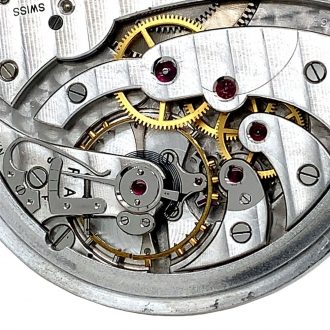 Elegant Swiss aluminium open faced lever watch Circa 1946