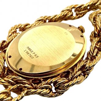 Swiss 18K gold necklace watch with lapis lazulli dial Circa 1972 Swiss 18K gold necklace watch with lapis lazulli dial Circa 1972
