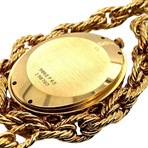 Swiss 18K gold necklace watch with lapis lazulli dial Circa 1972 Swiss 18K gold necklace watch with lapis lazulli dial Circa 1972