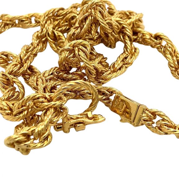 Swiss 18K gold necklace watch with lapis lazulli dial Circa 1972 Swiss 18K gold necklace watch with lapis lazulli dial Circa 1972