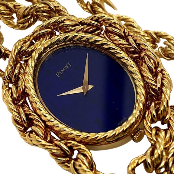 Swiss 18K gold necklace watch with lapis lazulli dial Circa 1972 Swiss 18K gold necklace watch with lapis lazulli dial Circa 1972