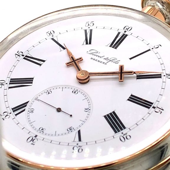 Oversized Swiss silver and rose gold lever watch Circa 1900 Oversized Swiss silver and rose gold lever watch Circa 1900