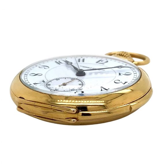 Swiss 18K gold open faced lever watch with alarm Circa 1921 Swiss 18K gold open faced lever watch with alarm Circa 1921