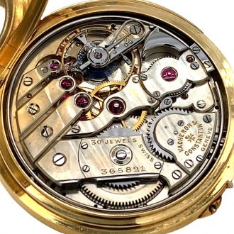Swiss 18K gold open faced lever watch with alarm Circa 1921 Swiss 18K gold open faced lever watch with alarm Circa 1921