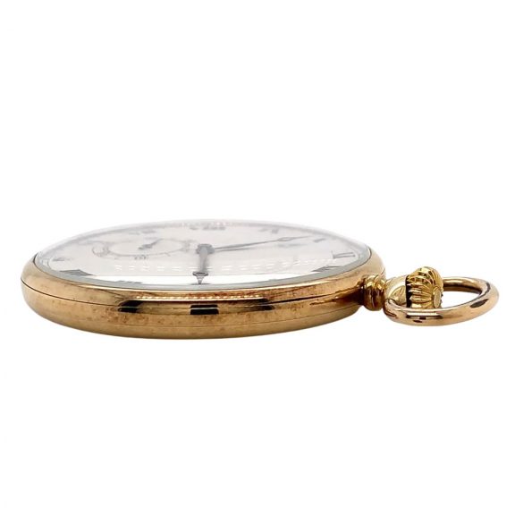 Flat Swiss 18K gold open faced lever pocket watch Circa 1910 Flat Swiss 18K gold open faced lever pocket watch Circa 1910