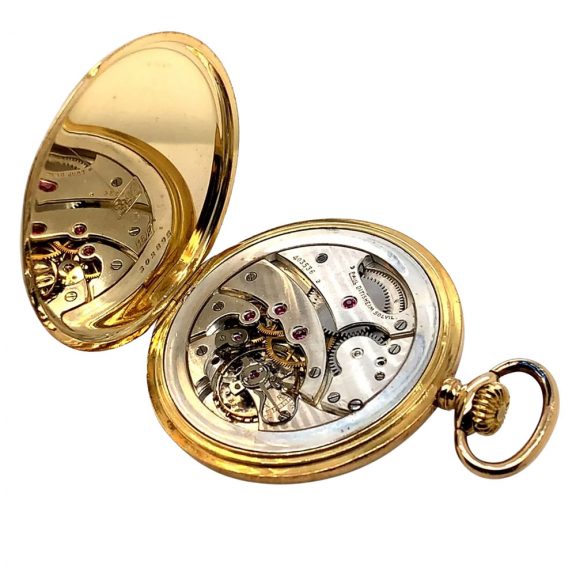 Flat Swiss 18K gold open faced lever pocket watch Circa 1910 Flat Swiss 18K gold open faced lever pocket watch Circa 1910