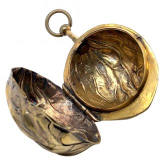 Exceptional German walnut shaped musical verge watch Circa 1890