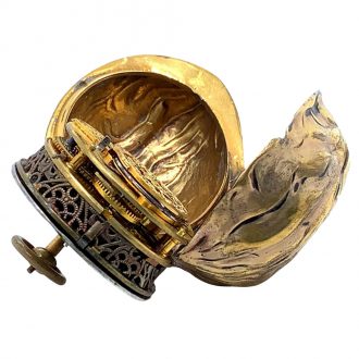 Exceptional German walnut shaped musical verge watch Circa 1890