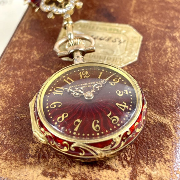 Swiss gold, enamel and diamond set watch with brooch Circa 1895 Swiss gold, enamel and diamond set watch with brooch Circa 1895