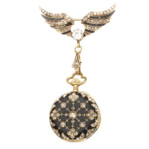 suspended from a conforming winged brooch