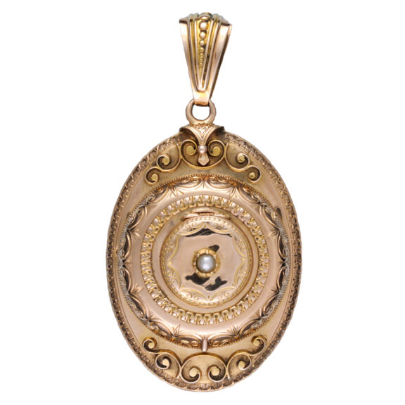 Swiss cylinder in unusual gold oval pendant case Circa 1860 Swiss cylinder in unusual gold oval pendant case Circa 1860