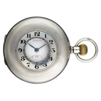 Swiss lever in an engine turned silver half hunter case Circa 1919