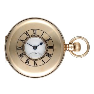 A Swiss lever pocket watch in a gold half hunter case Circa 1929