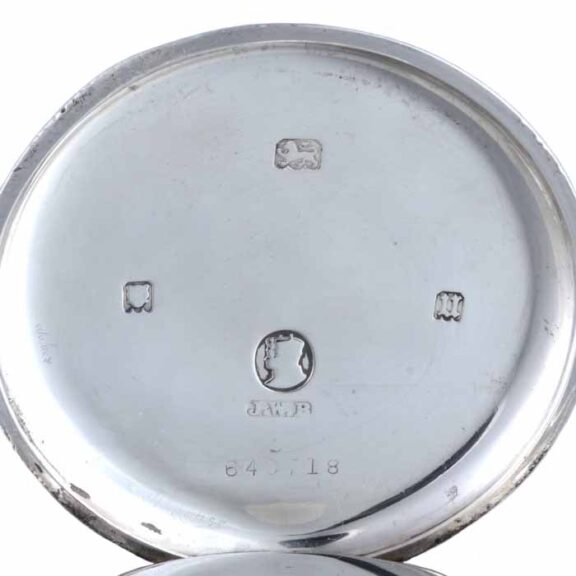 A Swiss lever pocket watch in a silver half hunter case Circa 1935 A Swiss lever pocket watch in a silver half hunter case Circa 1935