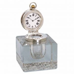 English cut glass inkwell with a silver top housing lever Circa 1905