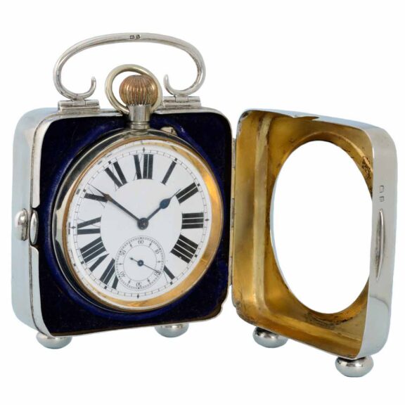 Swiss nickle cased watch in unusual silver clock stand Circa 1907 Swiss nickle cased watch in unusual silver clock stand Circa 1907