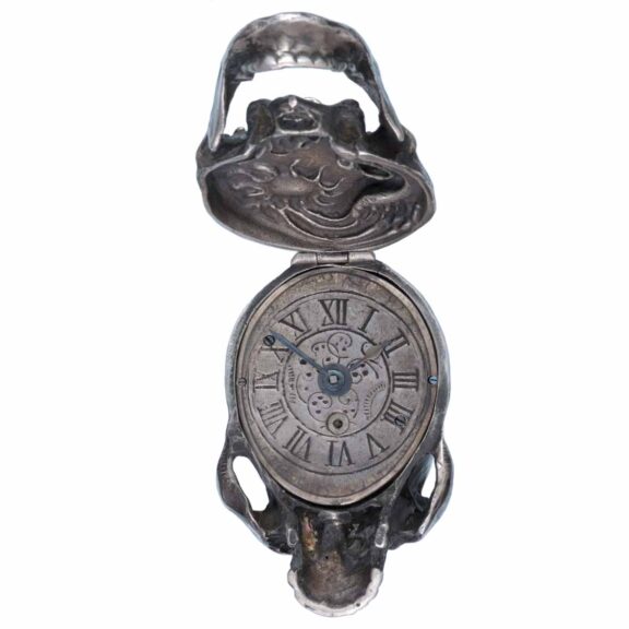 Swiss silver lever in the form of a skull with chain Circa 1920 Swiss silver lever in the form of a skull with chain Circa 1920