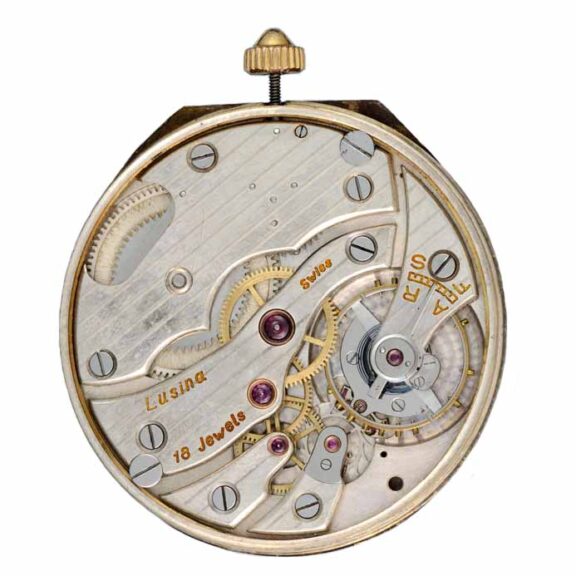 A Swiss gold and enamel lever dress watch and chain Circa 1920 A Swiss gold and enamel lever dress watch and chain Circa 1920