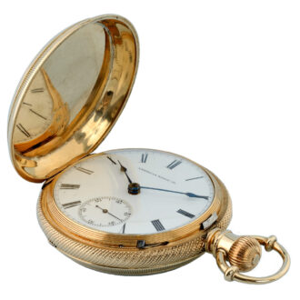 American lever in a gold engine turned full hunter case Circa 1885