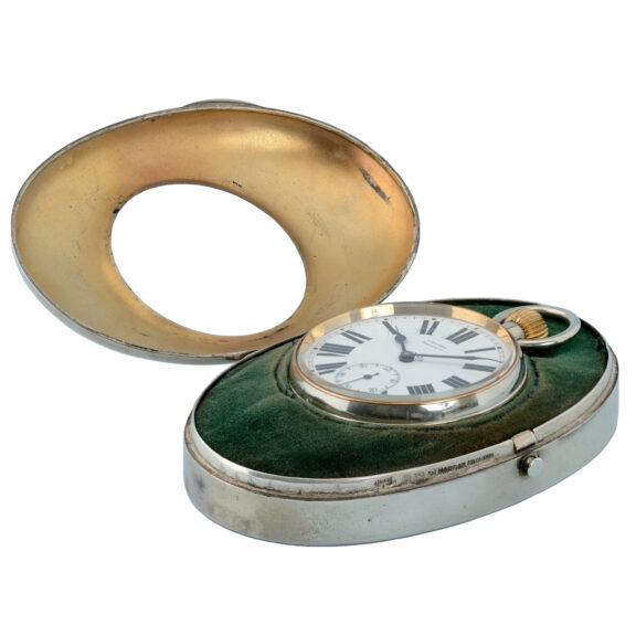 A Swiss nickle eight day lever fitted in a silver oval case Circa 1913
