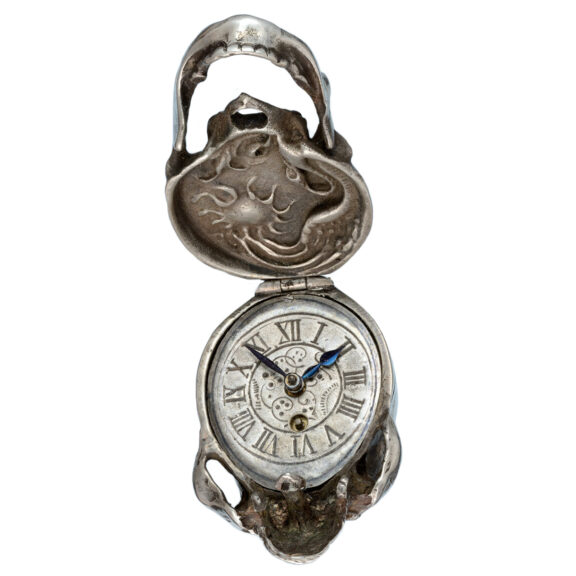 Swiss silver cylinder watch in the form of a skull Circa 1920 Swiss silver cylinder watch in the form of a skull Circa 1920