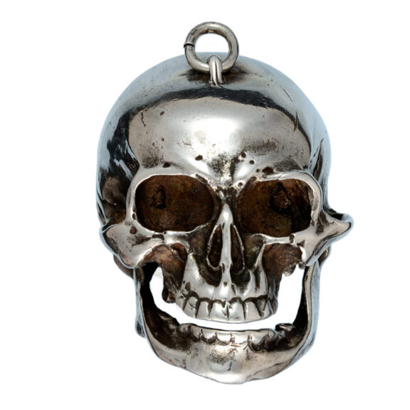 Swiss silver cylinder watch in the form of a skull Circa 1920 Swiss silver cylinder watch in the form of a skull Circa 1920