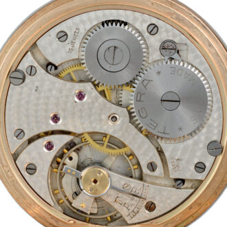 A Swiss lever pocket watch in a gold half hunter case Circa 1926