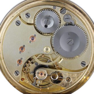 A Swiss lever pocket watch in a gold half hunter case Circa 1927