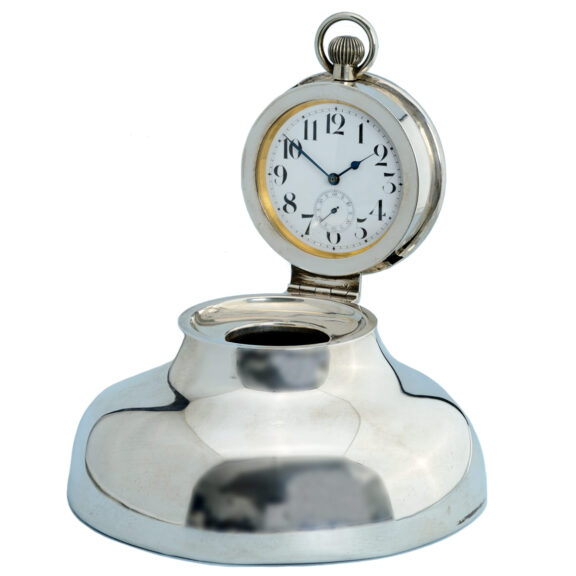 Silver inkwell housing a goliath pocket watch in the lid Circa 1929