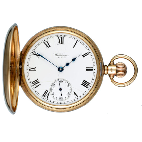 American lever pocket watch in a gold half hunter case Circa 1934 American lever pocket watch in a gold half hunter case Circa 1934