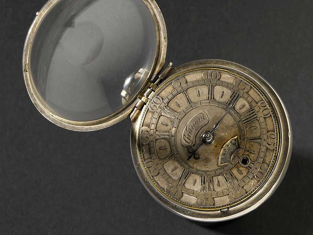 The silver and tortoiseshell case.