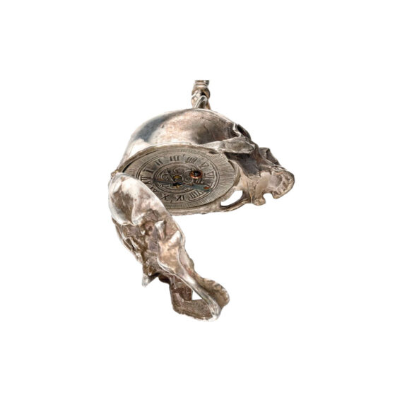 Swiss silver skull form lever watch and chain Circa 1920 Swiss silver skull form lever watch and chain Circa 1920