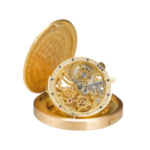 Rare gold, diamond set skeletonized coin watch Circa 1991