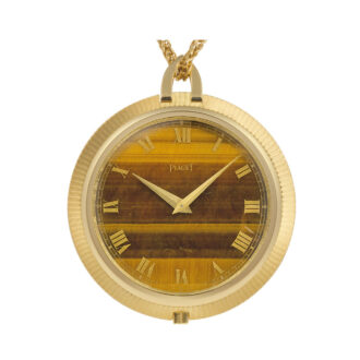 Swiss gold watch with tiger eye dial and chain Circa 1978
