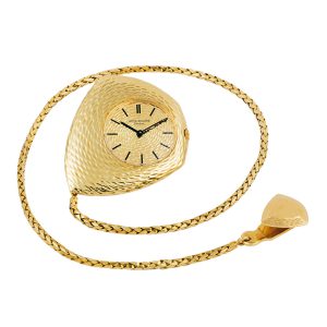 Rare and unusual Swiss gold Ricochet watch with chain Circa 1965