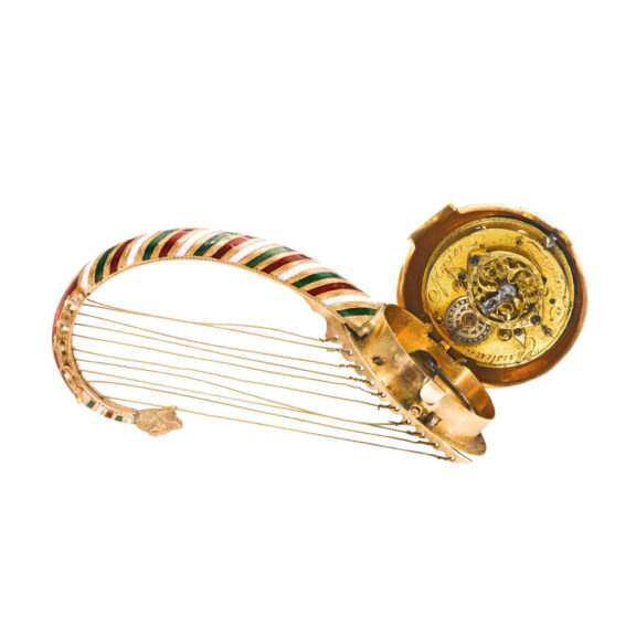 Austrian gold, enamel Egyptian harp form watch Circa 1850 Austrian gold, enamel Egyptian harp form watch Circa 1850