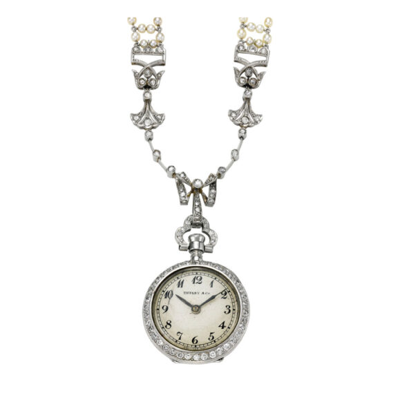Swiss platinum, diamond/pearl set pendant watch Circa 1910 Swiss platinum, diamond/pearl set pendant watch Circa 1910