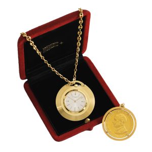 Historical Swiss gold lever watch with medal Circa 1955