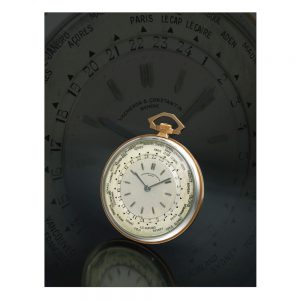 Fine, rare white and rose gold world time lever Circa 1933